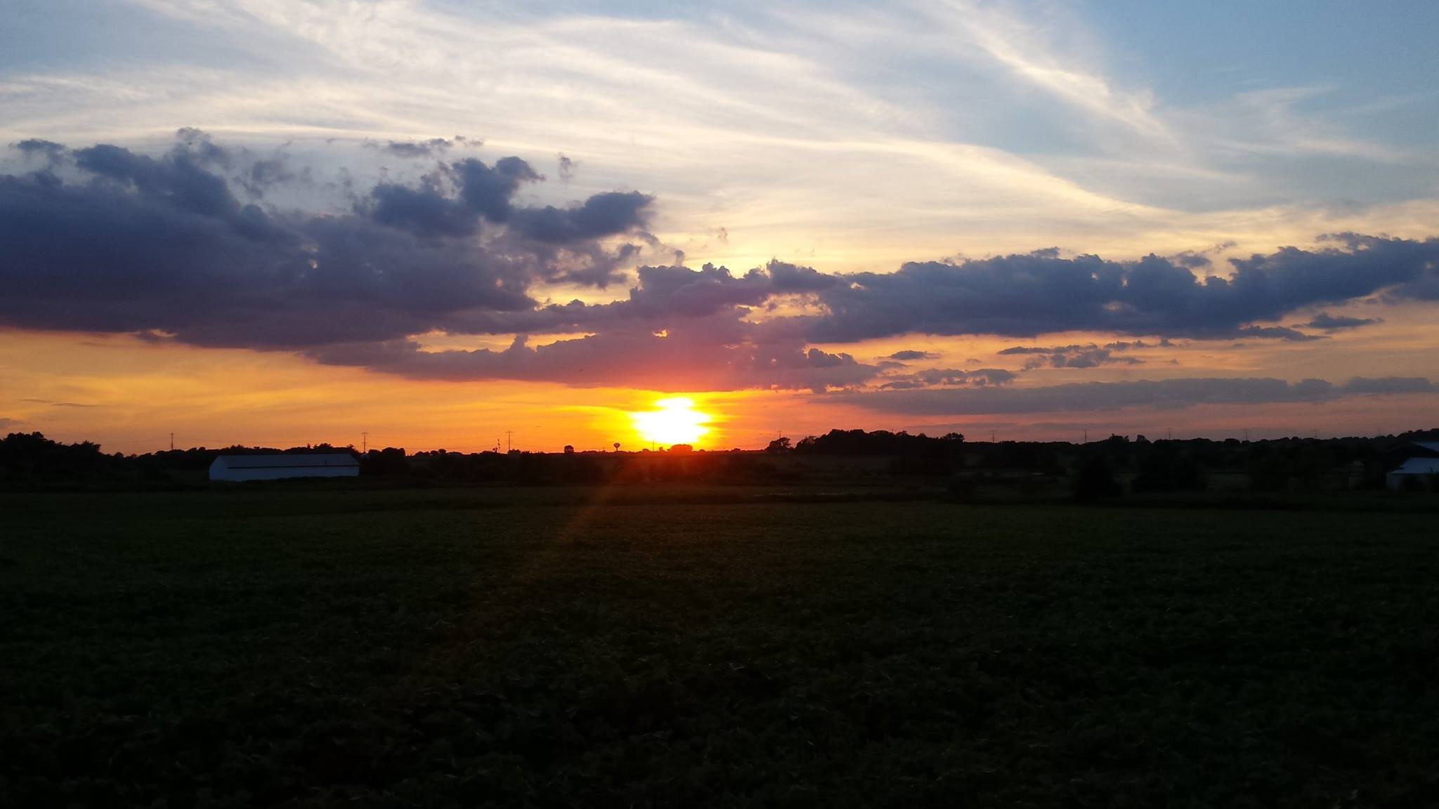 sunset_over_field_by_abekowalski-d8hvblm