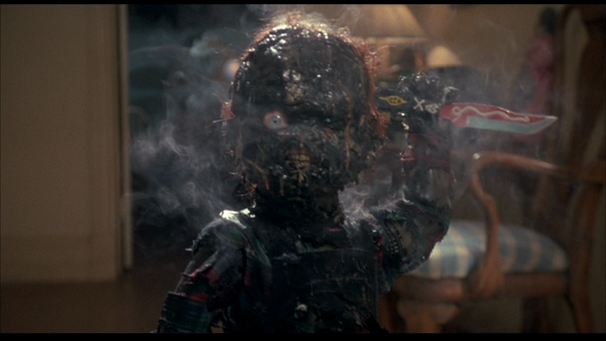 Childs-Play-1988-Chucky-burned.png