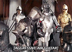 suit-of-armor-air-guitar.gif